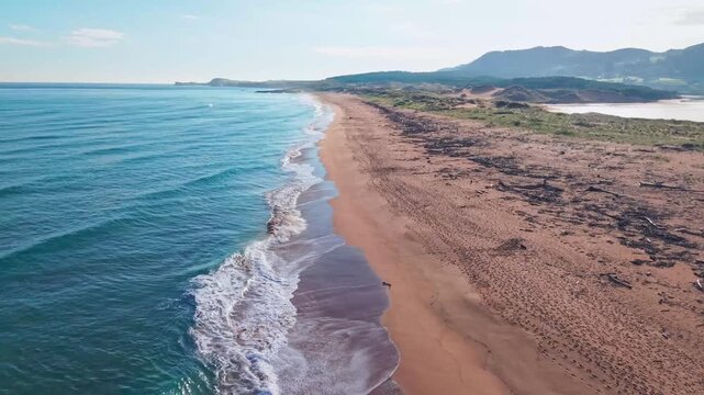 Aerial view of Liencres beach and Costa Quebrada rugged coastline in Cantabria, Spain