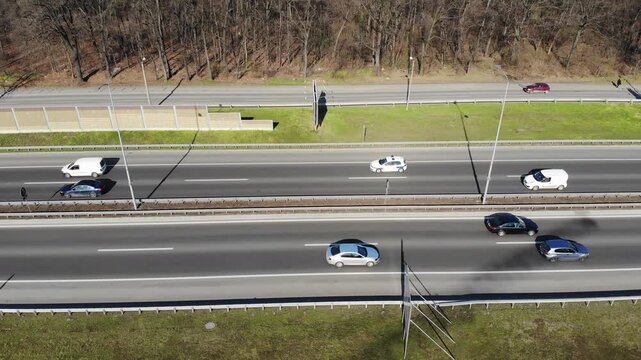 Lateral flight over suburban highway with frequent vehicle traffic, Belgrade, Serbia.