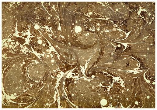 Intricate Turkish Ebru shawl marbling with feathered swirling patterns in brown and gold tones. Traditional tarakli combed technique on handmade paper.