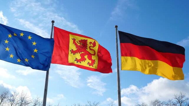 European union, north rhinewestphalia, and german flags flying together
