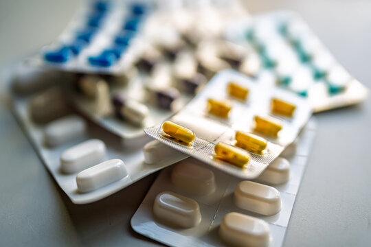 Assorted pharmaceutical blister packs with capsules and pills