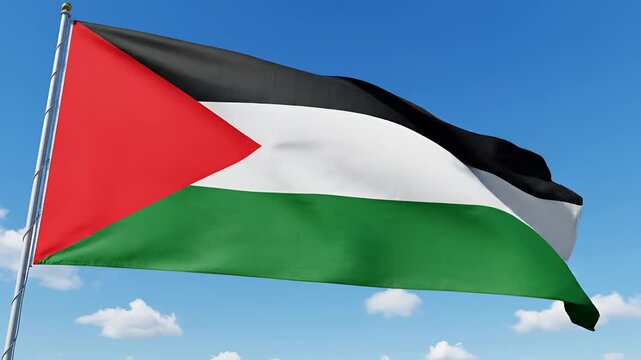 Palestinian Flag Waving in the Wind Against a Blue Sky with Clouds.