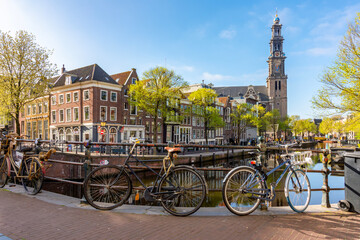 Fototapeta premium Amsterdam canals and Westertoren tower in Jordaan district, Netherlands