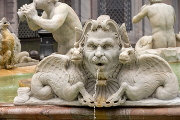 Fototapeta premium Walk around Piazza Navona in Rome, with 17th-century marble sculptures of sea gods and other creatures decorating the fountains, and magnificent examples of art and architecture