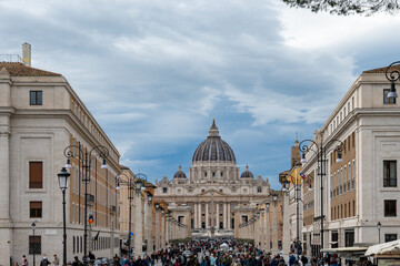 Fototapeta premium Walking in Rome and view on St. Peters Basilica, travel destination in Italy, Vatican City State, popes residence, sacred place, guided tour Rome, visit of Basilica and Dome