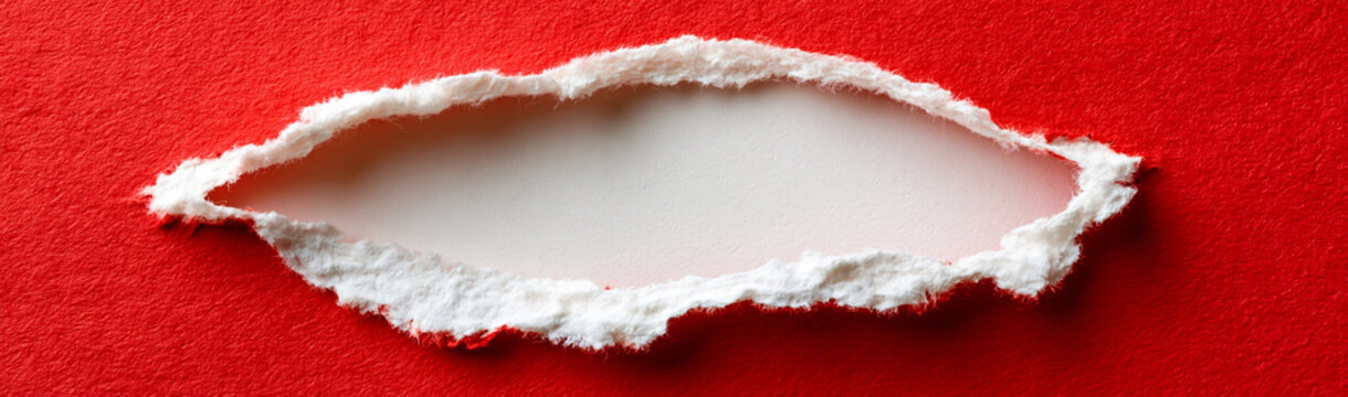 Torn Paper Revelation: A vibrant red sheet reveals a blank, pristine space, inviting curiosity and symbolizing a hidden message or opportunity. 