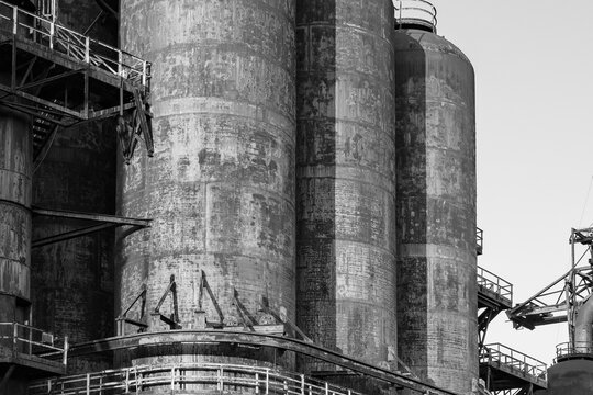 Black and white image of the rusting and peeling exterior of the storage tanks at the Bethlehem Steelworks in Pennsylvania