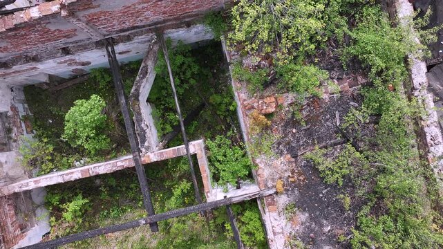 Aerial ruins communist state farm Poland climb 1. Soviet State Agricultural Farm or State-Owned Farm. Collective agriculture employment and housing. Fall of Russia communism socialism farming.