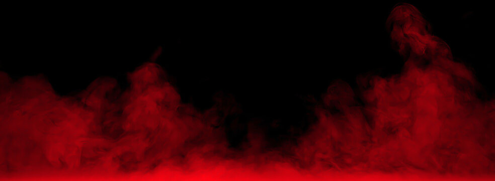 Red smoke texture isolated on black background with dramatic fog movement swirling vapor and abstract mist effect. Ideal for cinematic overlays horror themes energy visuals and dark atmospheric design