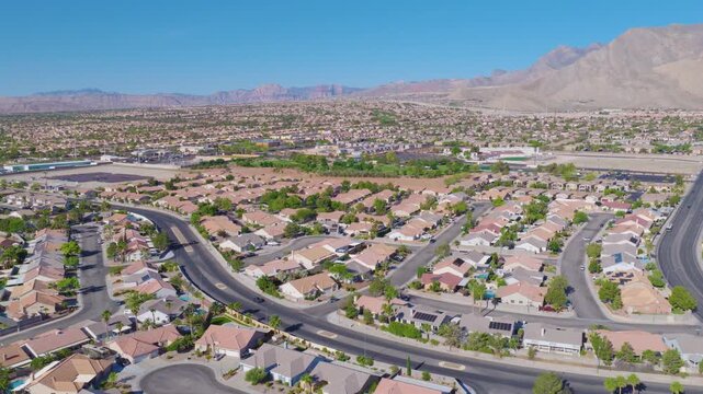 Las Vegas Aerial Pullback View of Suburban Homes and Desert Mountains