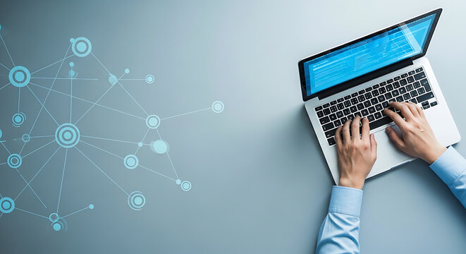 Top view of professional working on laptop with abstract digital network graphic, symbolizing data analysis, technology, and global connectivity on a modern desk