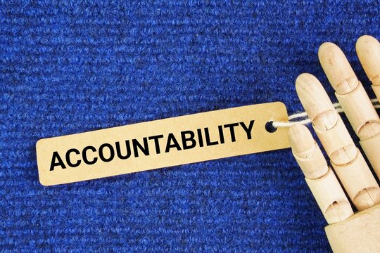 Paper tag with word ACCOUNTABILITY. concept of responsibility. responsibility for one's actions and decisions and being accountable for their outcomes