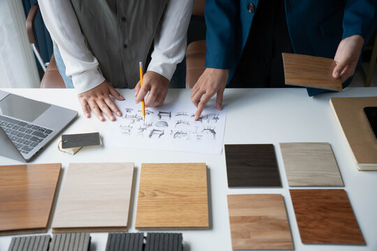 Interior Designer Consulting with Client on Material Selection