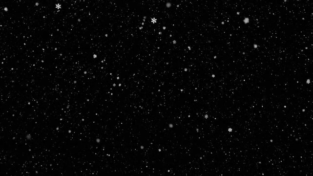 White snowflakes falling gently against a dark black background