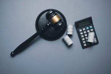 Legal Gavel with Calculator and Oil Barrels Representing Energy Litigation and Fuel Industry...