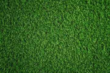 Fototapeta premium Artificial green grass texture background for sports field