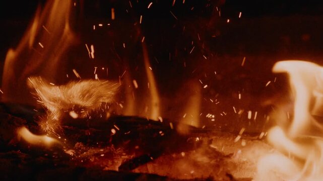 fire and smoke in fireplace outdoor ambience close up 