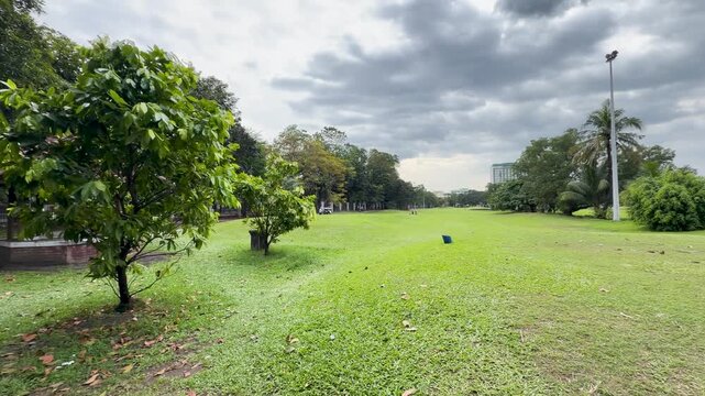 Moving View of a Lush Green Golf Course Fairway in Manila