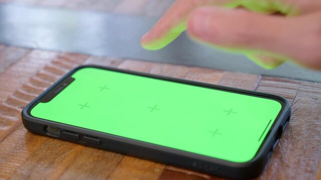 Smartphone green screen, mobile phone mockup, chroma key, touchscreen device