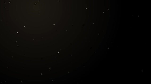 Atmospheric dust particles floating gently with subtle light rays and lens flare motion on black background