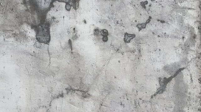 Texture concrete wall of light grey color cement texture background.Grey pastel rough crack cement texture stone concrete,rock plastered stucco wall; painted flat fade background. Side view. gray.
