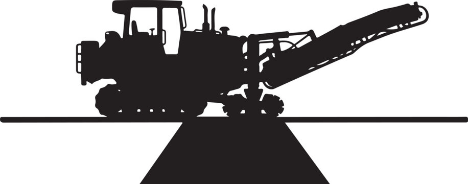 Silhouette of a road milling machine on a highway silhouette