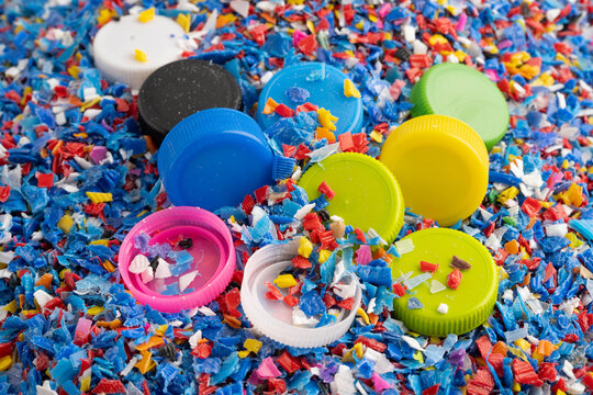 Bangkok, Thailand April 20, 2024 Plastic recycle pellets and caps for industrial use.