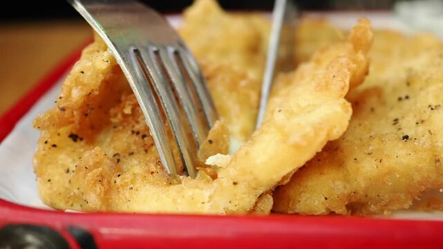 Fried fish cooking process at a local restaurant