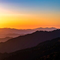 Fototapeta premium Sunset over mountain range landscape view.