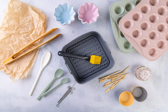 Assorted kitchen utensils for air fryer or oven baking
