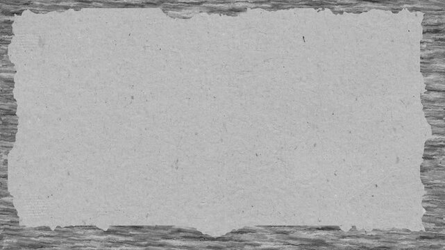 Torn paper texture on grunge wood grain border for abstract backgrounds and creative design projects