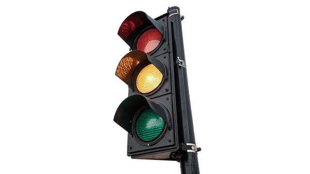 Standard traffic light showing red yellow and green signals for road safety and transportation control isolated on transparent background cut out