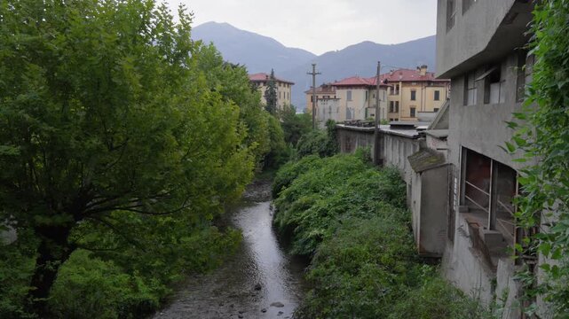 Mastallone River flowing through the town of Varallo Sesia in Italy