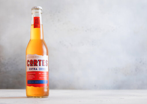 LONDON,UK - NOVEMBER 29, 2025: Bottle of Cortes Extra Tequila beer mix on light table background.