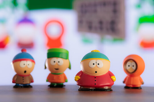 ISTANBUL, Turkiye - MAY 9 2026: South park cartoon characters: Kenny, Eric, Stan, Kyle as toy figures on the background of the TV screen