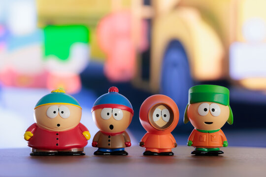 ISTANBUL, Turkiye - MAY 9 2026: South park cartoon characters: Kenny, Eric, Stan, Kyle as toy figures on the background of the TV screen