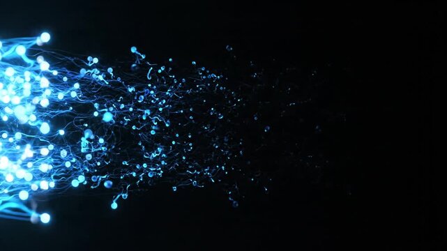 Glowing blue particles explode outward in a dark space with technology and science elements.