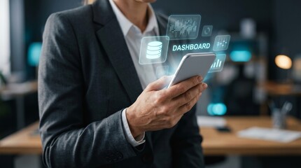 Fototapeta premium Businessman holding smartphone with holographic dashboard and data icons. Business analytics, mobile technology, and digital management concept.