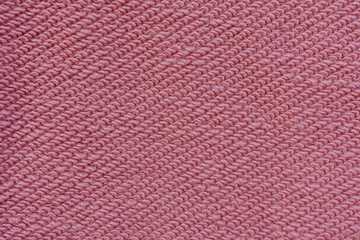 Fototapeta premium Pink loopback sweatshirt knit fabric reverse side texture close up