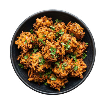 Spicy vegetable pakora fritters in bowl isolated on transparent background