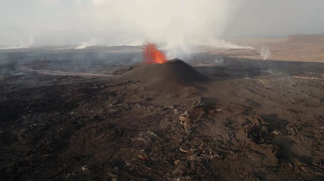 Aerial view of glowing lava erupting from an active icelandic crater