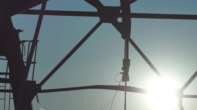 A pumpjack is the overground drive for a reciprocating piston pump in an oil well, commonly known as a "nodding donkey" or beam pump.