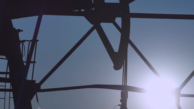 A pumpjack is the overground drive for a reciprocating piston pump in an oil well, commonly known as a "nodding donkey" or beam pump.