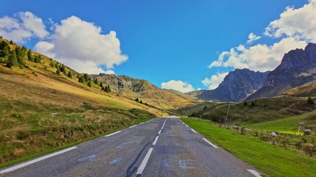 Driving up the Col du Tourmalet steep road, located in the center of the Pyrenees chain, in the Hautes-Pyrenees department in France, highest mountain pass in Pyrennes, famous Tour de France climb