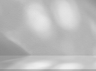 Shadow light on white wall,Grey floor background,Interior room studio and soft natural sunlight on...