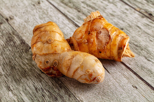 Raw galangal roots heap seasoning