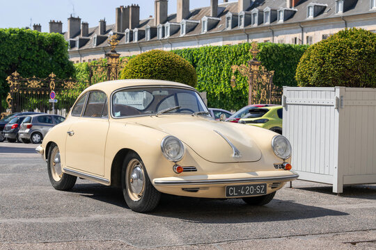Nancy, France - May 9th 2026 : View on a beige Porsche 356C parked on a street.