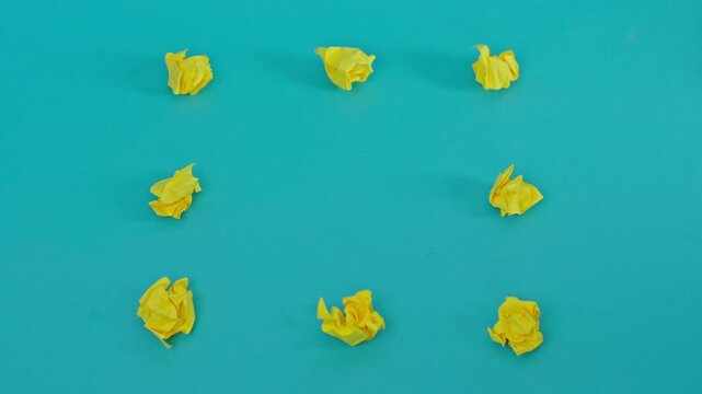 Hand Replacing Red Crumpled Paper With Yellow One To Complete Perfect Grid For Concept Of Order And Ocd