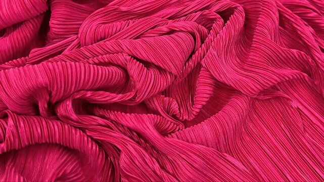 Premium magenta textile featuring a sophisticated micro pleat design with a luminous finish and fluid movement perfect for high fashion garments luxury event decor and creative sewing projects