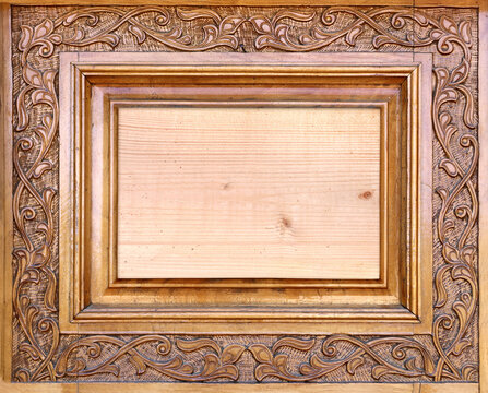 Wooden frame with islamic ornament. Antique wood backdrop with oriental ornaments. Traditional moroccan wood carving shutter with floral decor. Copy space for text